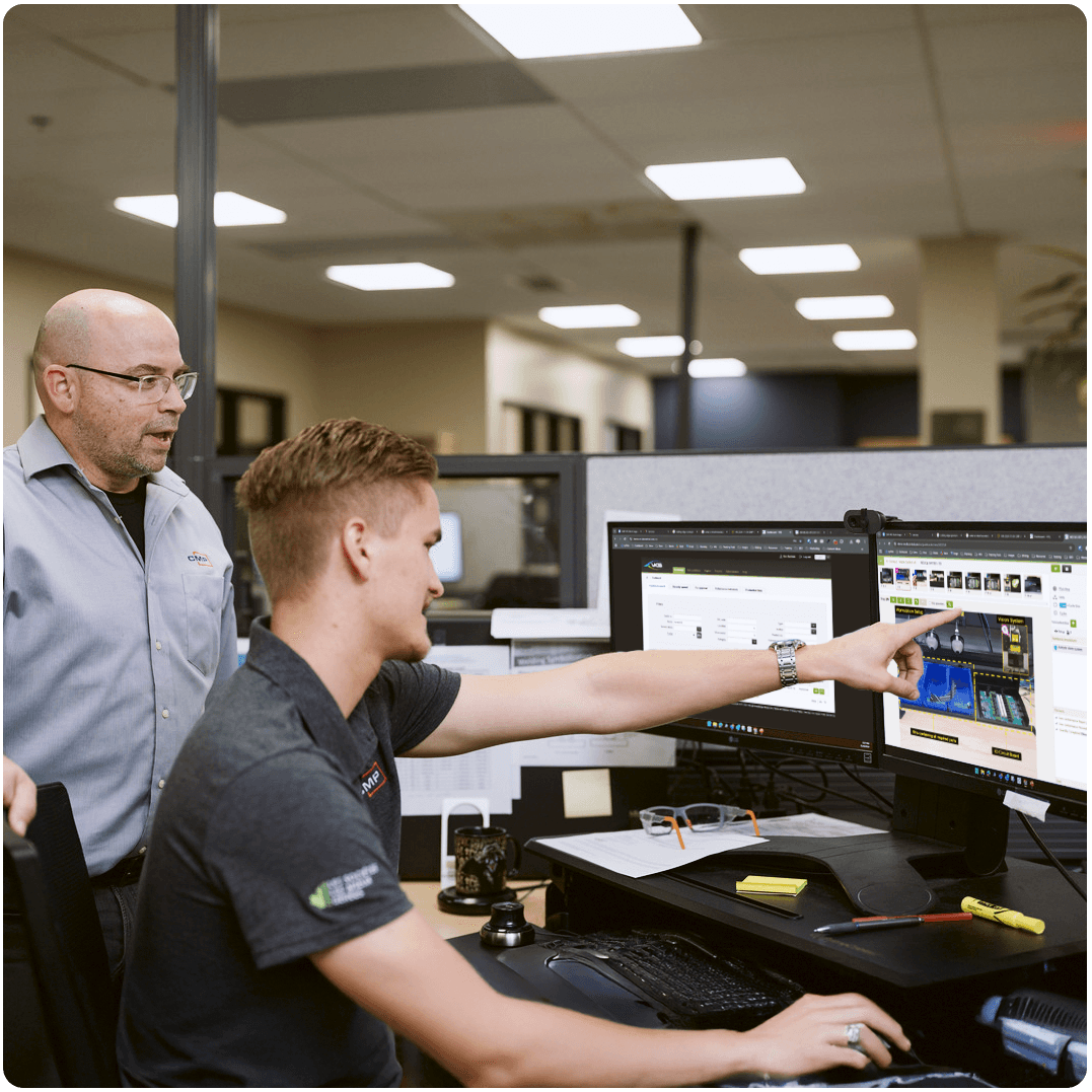 Two people using VKS work instructions for training and task guidance