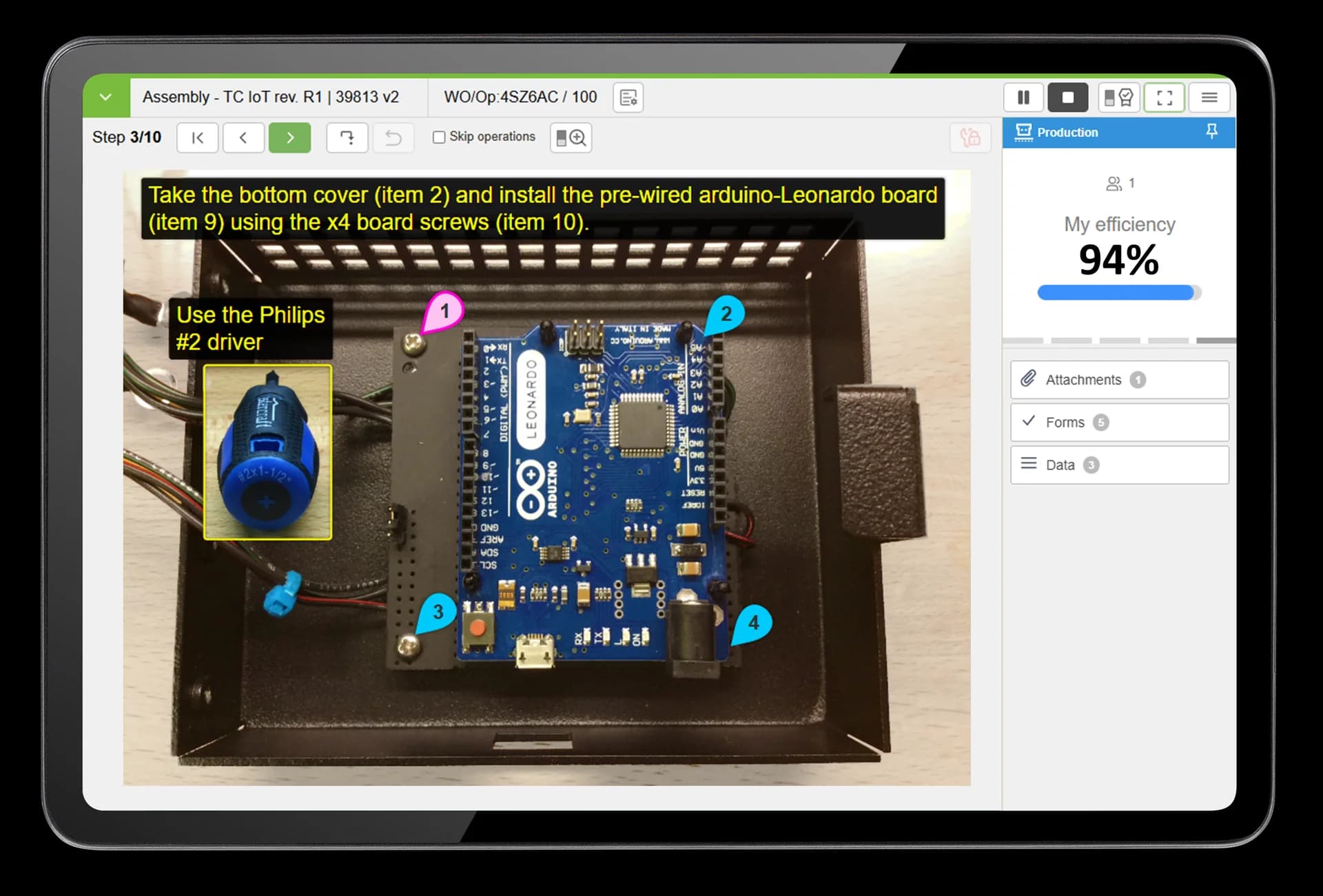 Tablet displaying VKS Arduino assembly instructions with UI overlays for process time and efficiency.